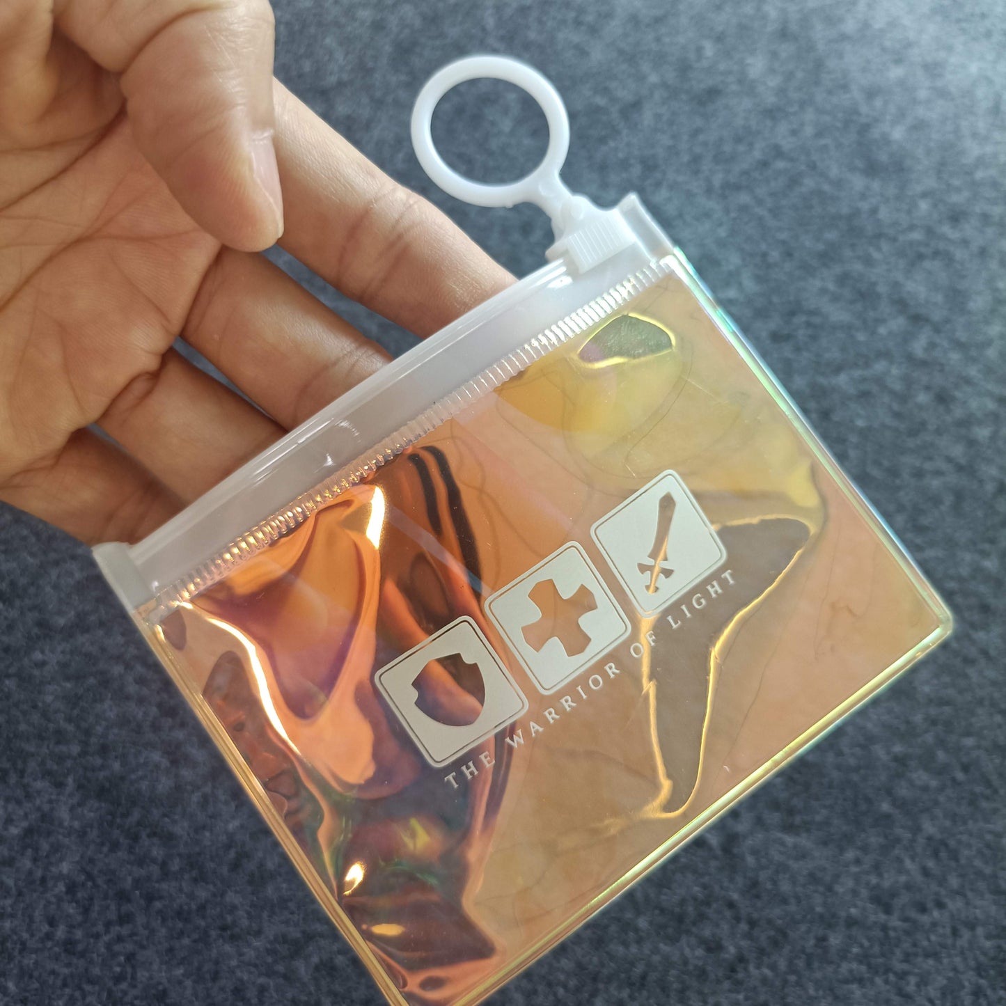 mini holo pouch - warrior of light