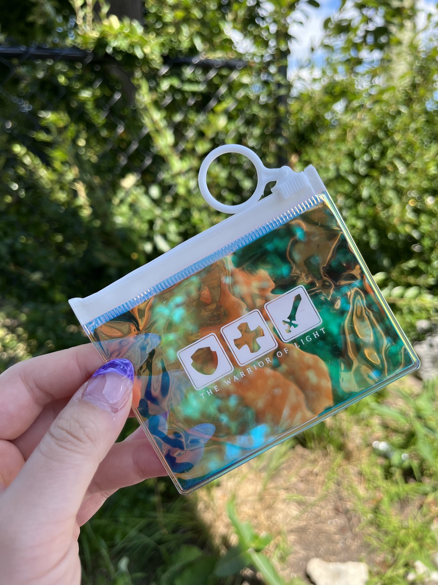 mini holo pouch - warrior of light